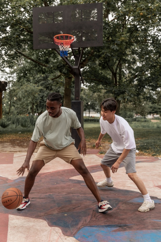 Liam playing basketball during a session